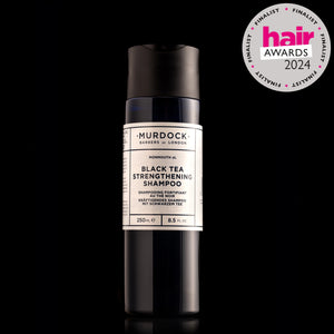 black tea  strengthening shampoo front on with hair awards finalist 2024 badge