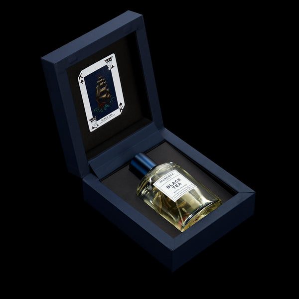 Black Tea Cologne displayed in its open box